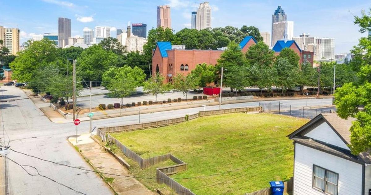 Cleared lot in shadow of downtown wants a million bucks. Any big ideas
